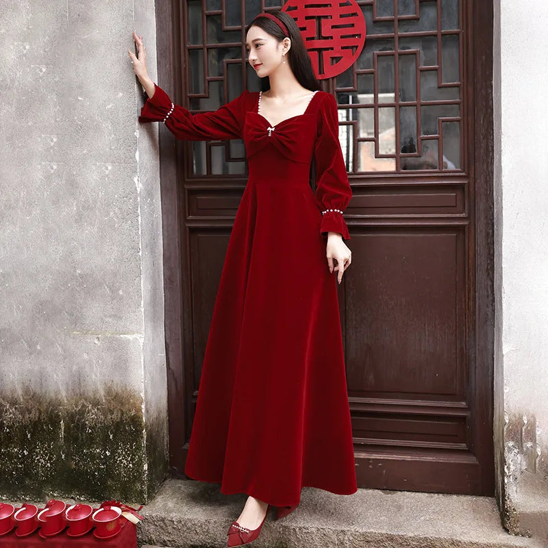 Long sleeve red velvet gown hotsell