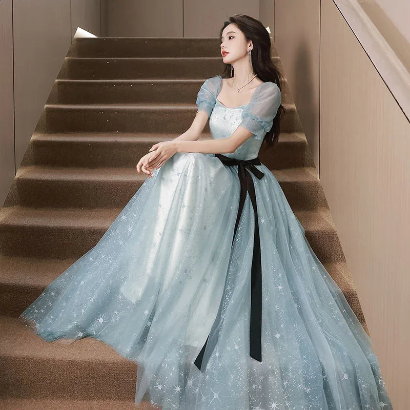 Elegant Blue Tulle Gown with Black Belt