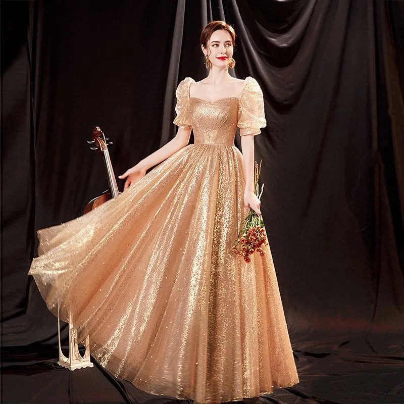 Gold evening gowns with sleeves discount